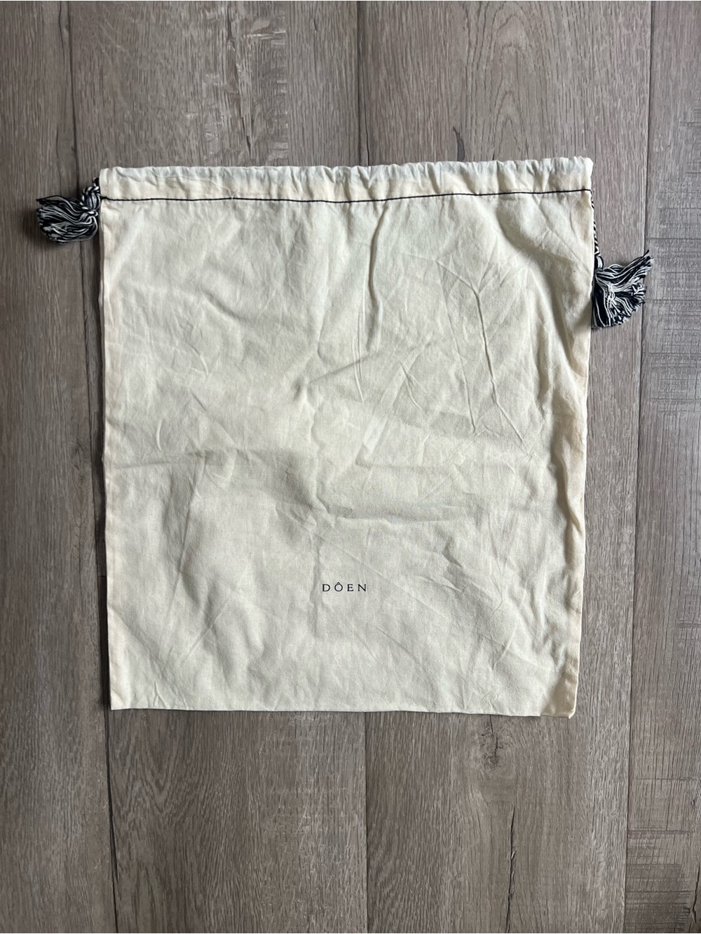 Doen Cream Cotton Drawstring Dust Bag with Black Tassels